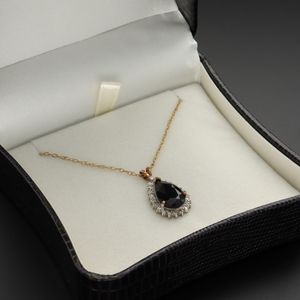 9ct Gold Diamond and Sapphire Pendant