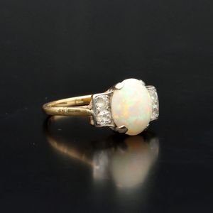 18ct Gold Opal and Four Diamond Ring