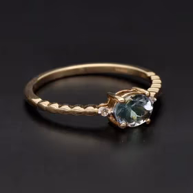 Gold Tanzanite and Diamond Ring