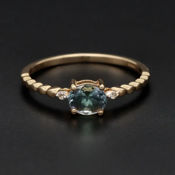 Gold Tanzanite and Diamond Ring