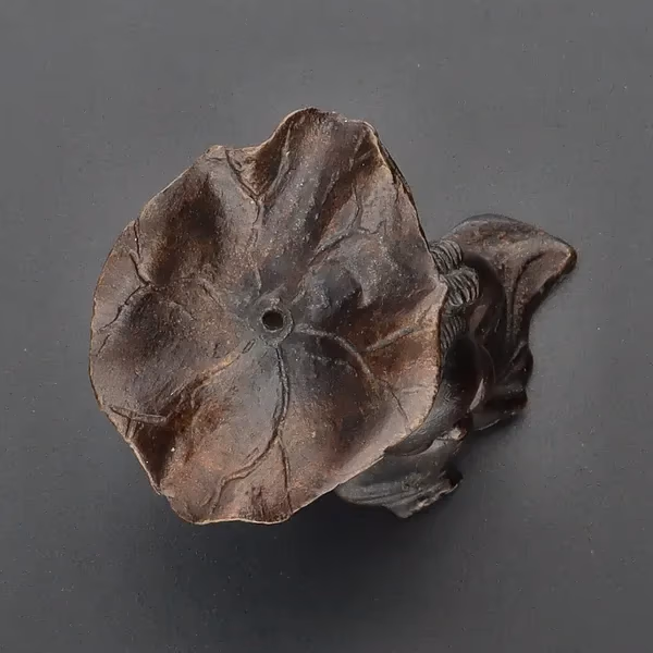 Bronze Figurine With Lotus Leaf