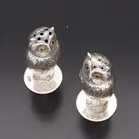 Pair of George V Silver Pepperettes Shaped as Owls