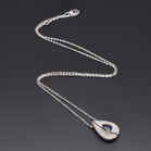 18ct White Gold Sapphire & Diamond Pear Shaped Pendant