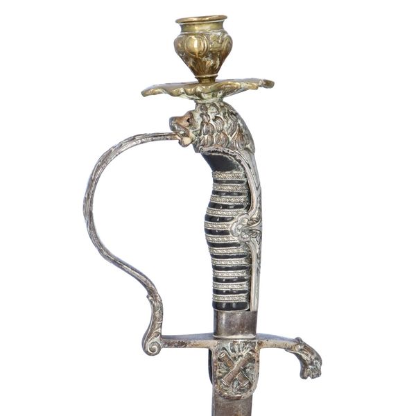Pair of Brass Military Sword Candlesticks