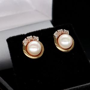 9ct Gold Diamond and Cultured Pearl Studs