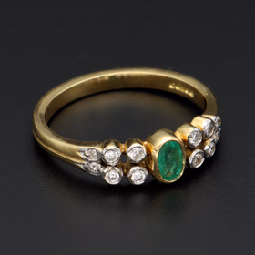 18ct Gold Emerald and Diamond Ring. Size M