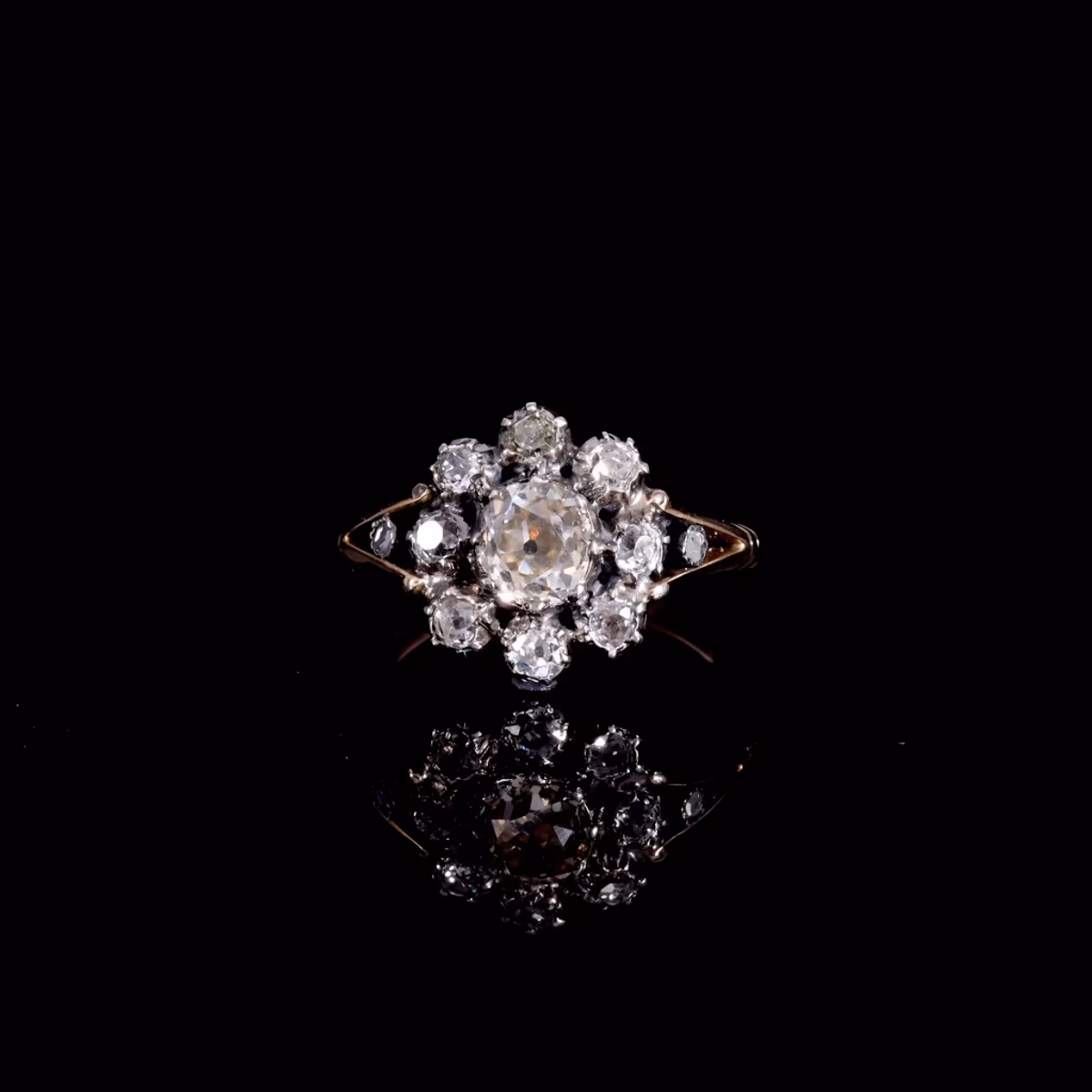 360° view of The Antique Georgian Eleven Old European Cut Diamond Cluster Ring