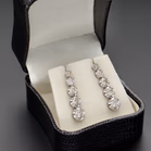 18ct White Gold Drop Earrings With Graduated Diamonds