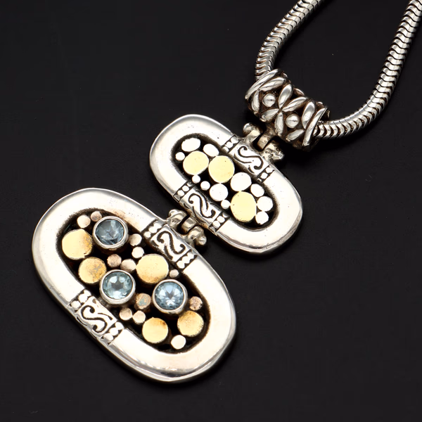 14ct Gold & Silver Pendant With Three Blue Topaz Stones