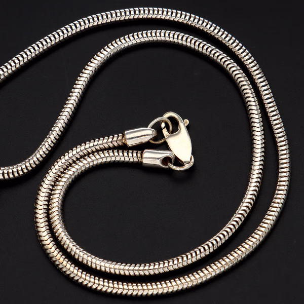 14ct Gold & Silver Pendant With Three Blue Topaz Stones